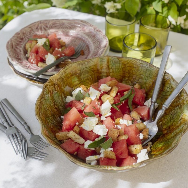 Sthal Arabesque salad bowl and plates in an outdoor dining scene.