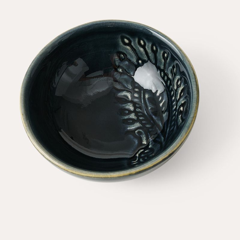Overhead view of Sthal Arabesque Fig dip bowl highlighting glossy glaze and ornate detailing.