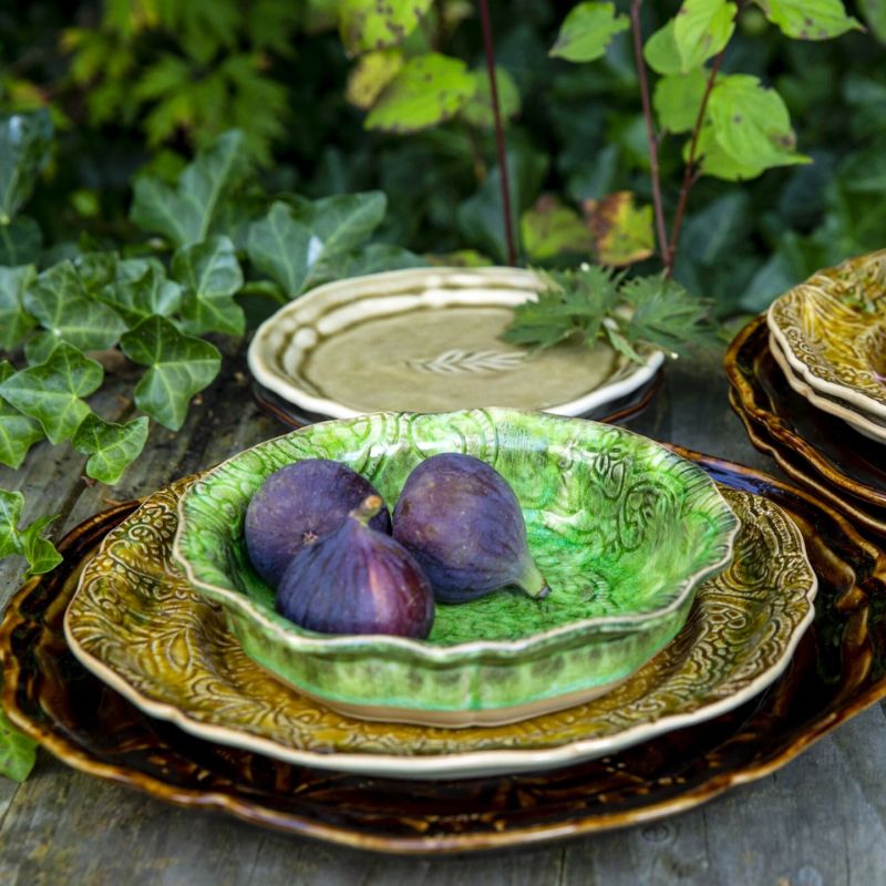 Sthal Arabesque Seaweed small bowl stacked with other plates, styled with fresh figs.