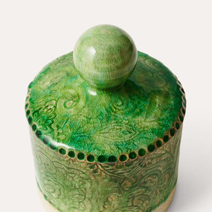 Sthal Arabesque ceramic tea caddy in Seaweed green showing intricate patterns and the crackling of a reactive glaze on a white background.