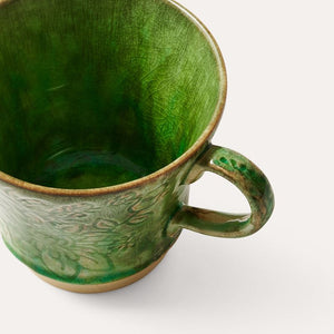 Inside view of the Sthal Arabesque Tea Mug in Seaweed – crackling detail of the reactive glaze shown.