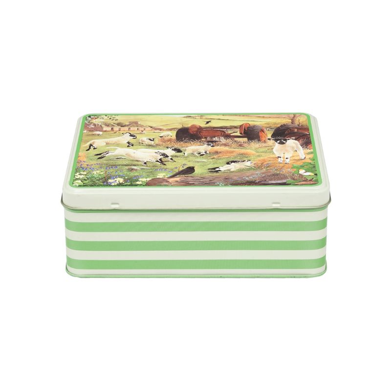 The Tracy Hall Woolly Jumpers Biscuit Tin with lambs and tractors on the lid and green stripes on the sides