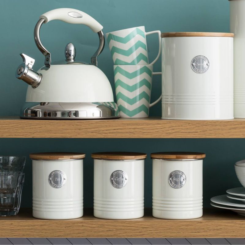 Typhoon Living Tea Canister in cream with silver label on front and bamboo lid.