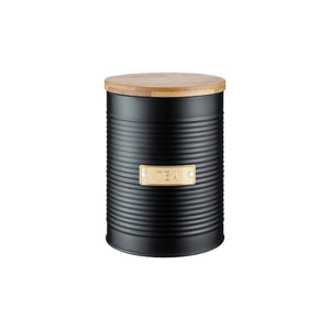 Typhoon Otto black ribbed tea canister with a bamboo lid and gold label.
