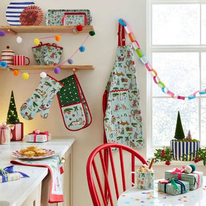 Ulster Weavers Christmas Cats collection styled in a festive kitchen.