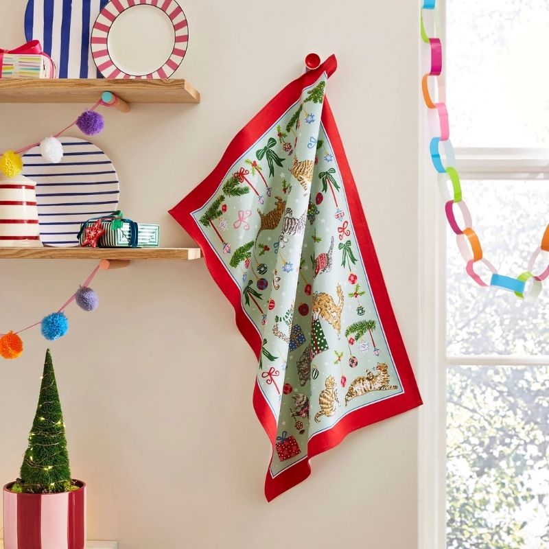 Ulster Weavers Christmas Cats Cotton Tea Towel on a white background.