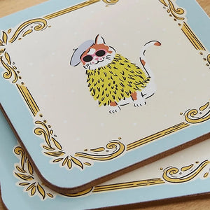 Ulster Weavers  Cool Cats Coasters shown stacked close up on a wooden table.