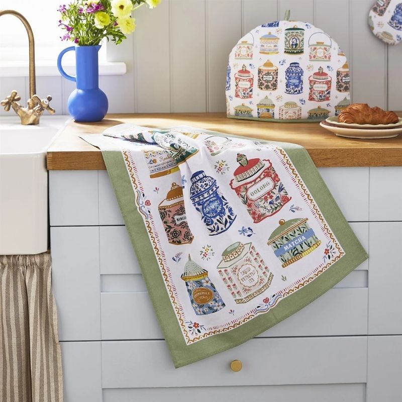 Ulster Weavers Tea Tins Cotton Tea Towel on a white background.