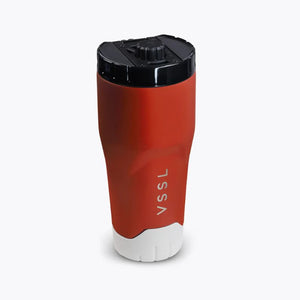 VSSL Rift Tumbler in Rusty Bucket with a black lid and grey base, featuring the vertical 'VSSL' logo on the front, set against a plain light gray background.