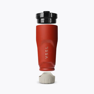 VSSL Rift Tumbler in Rusty Bucket with a black screw cap and a light grey base, shown on a plain white background.