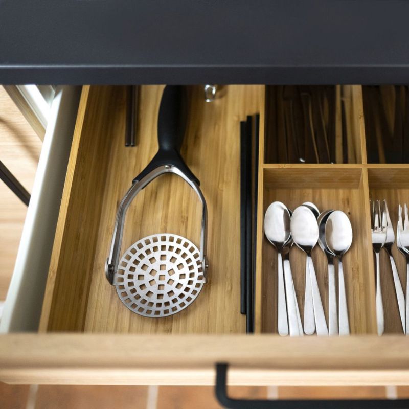 Westmark Folding Potato Masher angled view highlighting the foldable stainless steel mashing head