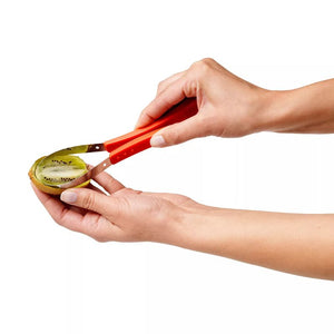 Westmark Fruit Cutter – 3 Piece Set being used to scoop fruit from a halved kiwifruit