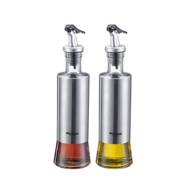 Westmark Oil & Vinegar Dispensers Set NZ - glass bottles with stainless steel casing and drip-free spouts on a white background.