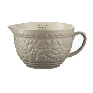 Mason Cash In The Forest Measuring Jug with both metric and imperial units shown.